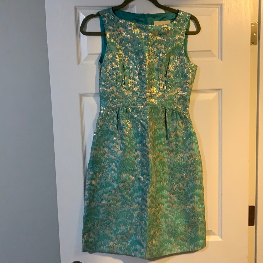 Micheal Kors spa teal blue and gold with pockets